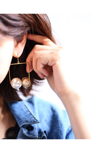 Wire pearl earring art art adult fashionable