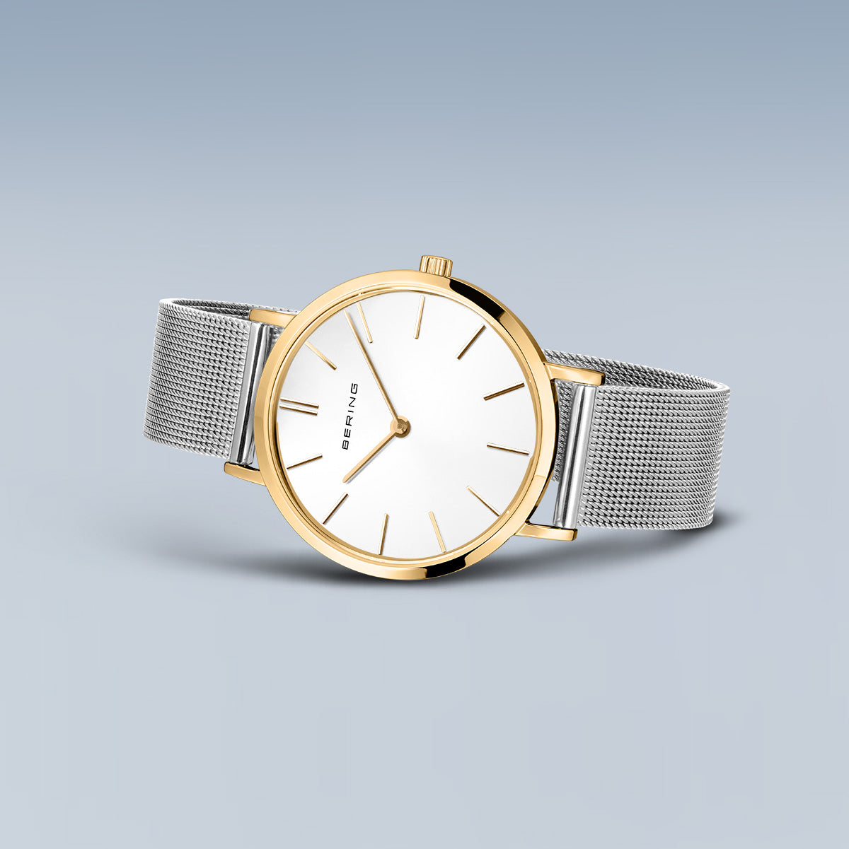 Bering Classic 34mm Polished Gold Case and Silver Strap Watch