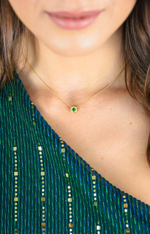 MILESTONE EMERALD HALO PENDANT IN GOLD