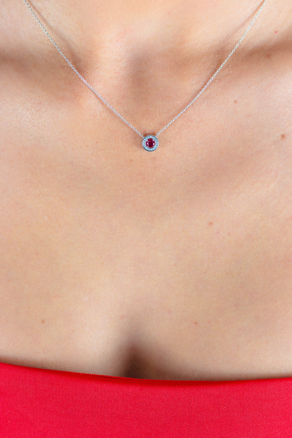 MILESTONE RUBY HALO PENDANT IN SILVER